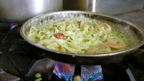 Creamy Shrimp Pasta Cooking on a Skillet