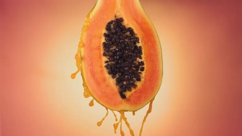Exotic Papaya Half with Dripping Juice