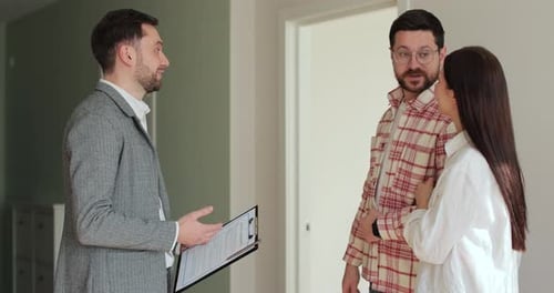 Close Up Young Family Choosing New House or Apartment Man Shake Hands After Making Successful Deal