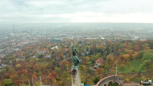 Autumnal reveal shot of liberty statue in Budapest, Hungary Europe