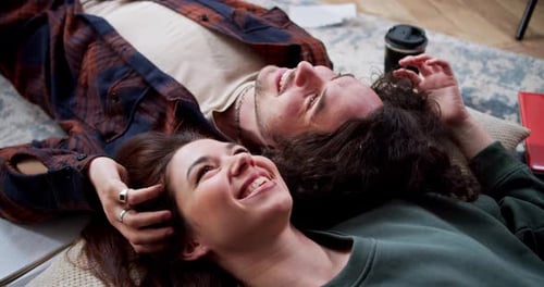 Affectionate Couple Smiling Together Indoors