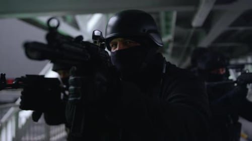 Front View Anti Terrorist Squad Looking Through Scopes on Automatic Rifles. Closeup