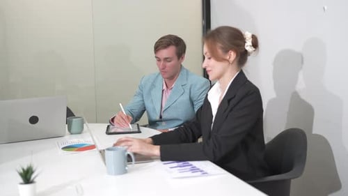 Meeting, documents and business people in office for report for planning, finance review or analysis