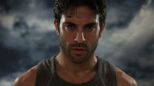 Exhausted Latin Man Looking At Camera During A Break Of His Outdoor Jogging Training. Portrait Of...
