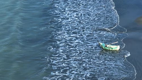 Aerial view of boat on beach, Bangladesh.
