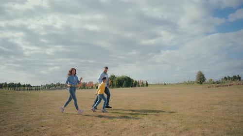 Happy Caucasian Family Mother Woman Female Father Male Man Active Playing Run Race Parents Play