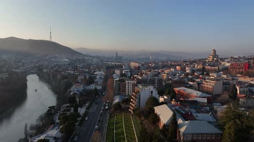 Aerial view of center of Tbilisi under Mtatsminda mountain, Georgia 2022