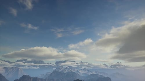 Majestic Winter Mountain Range Panorama Under a Blue Sky