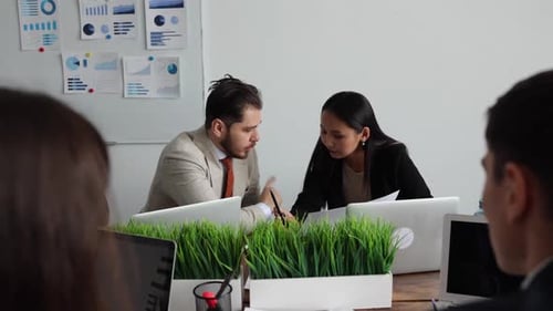 Diverse Group of Professional Businesspeople Meeting in the Modern Office Conference Room