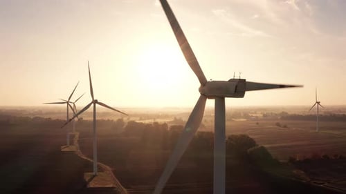 Aerial View Wind Turbines in Rising sunWind Farm Eco Field Energy Generation