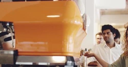 4k video footage of a group of people ordering coffee from a barista in a cafe