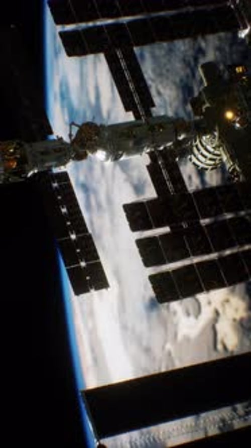 View of the International Space Station Orbiting Earth at Dawn