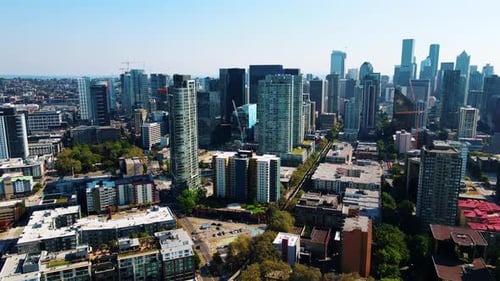 incredible shot of Seattle buildings, rising drone with beautiful summer colors