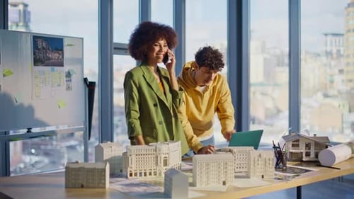 Real Estate Specialists Calling Reacting on Great News Happily in Office Company