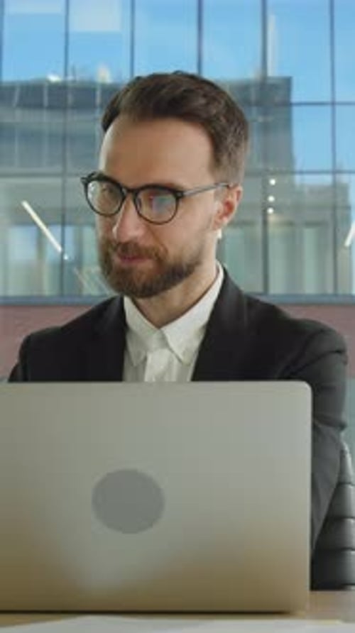 Focused Businessman Working in Modern Office Building