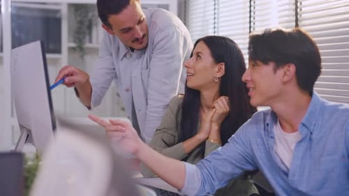 Group of Asian businessman and businesswoman working in the office.