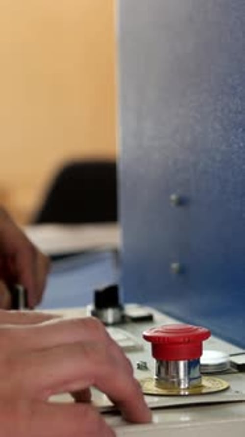 The Operator Controls the Machine in the Printing House