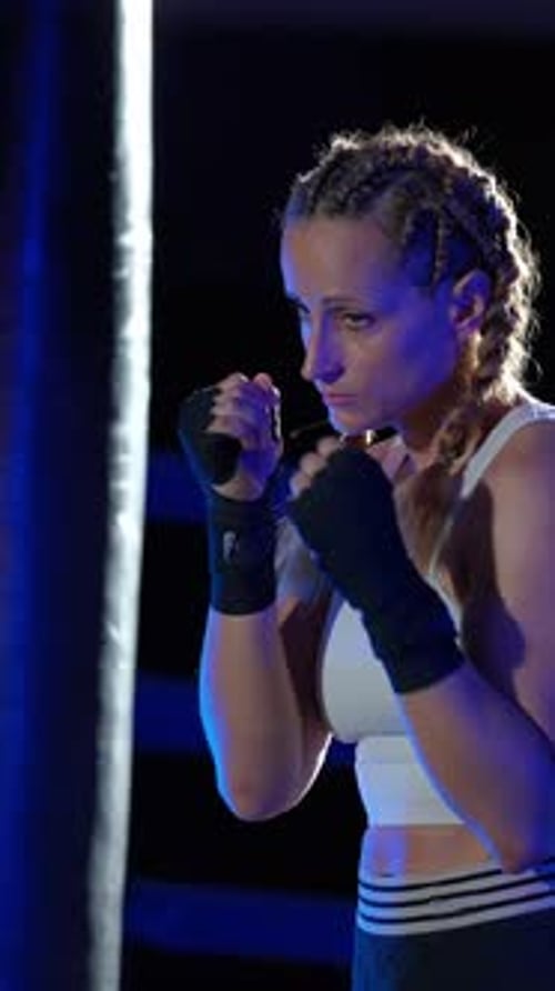 Woman Fighter Trains His Punches Training in the Boxing Gym Female Trains a Series of Punches