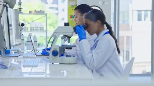 Laboratory, science and woman for microscope analysis or study virus sample in pharma lab