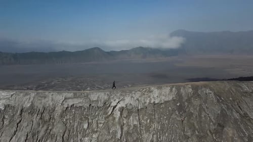 Man Walk Crater Volcano Drone