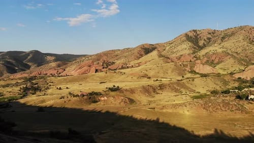 A drone pan revealing Red Rocks Amphitheater, Morrison CO.