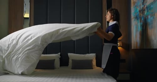 Cleaning In Luxury House Professional Maid Making Bed Of House Owners In Bedroom Housekeeping