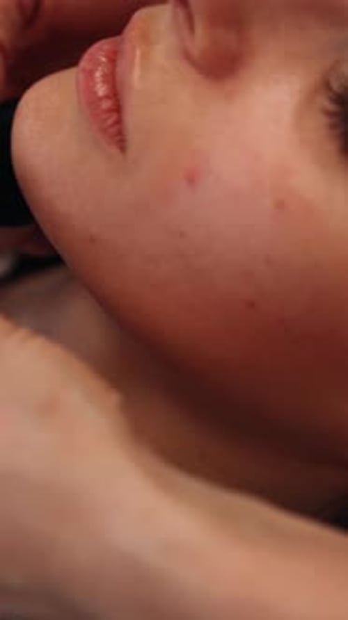 Female Face Massage with Gouache Vertical Video