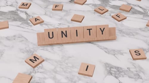 Wooden Scrabble Tiles Spell Unity on Marble