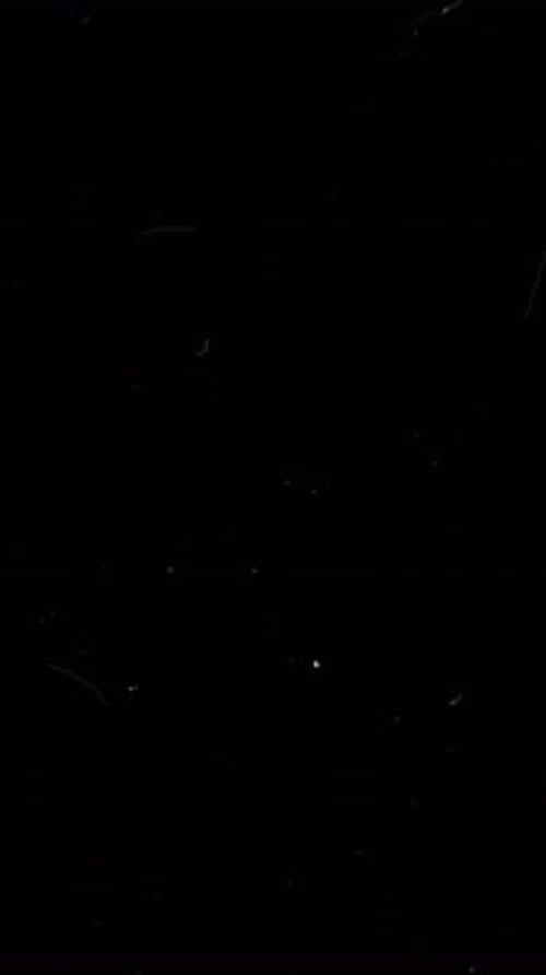 Cinematic Dust Particles Film Grain Overlay Effect