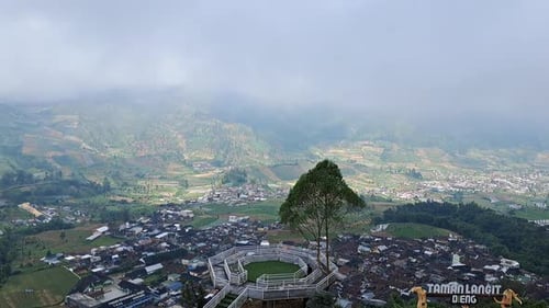 Mountain Timelapse with blowing clouds, taken from the top of the hill
