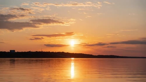 Golden Sunset Time Lapse Over Calm Water
