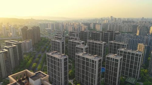 City Skyline at Sunrise Featuring Modern Highrise Buildings and a Vibrant Urban Landscape