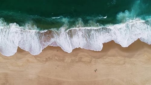 Aerial view of beach and breakwater, France.
