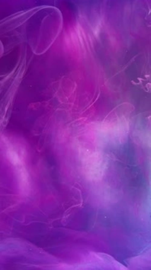 Colorful Ink Flowing in an Abstract Background