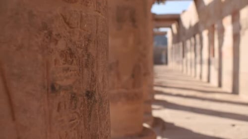Detail of columns and their shadows on a sunny day in the temple of Philae, Aswan, Egypt.
