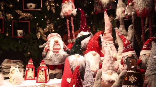christmas shopping for cute elf decorations at Festive Christmas market in Strasbourg, France Europe