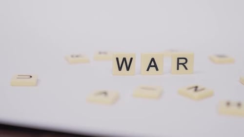 Letter Tiles Spelling out the Word War