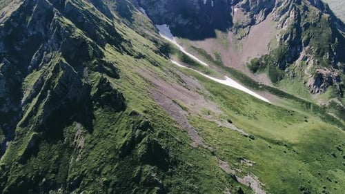 View from the high track in caucasus mountains glaciers, green grass, wild lakes