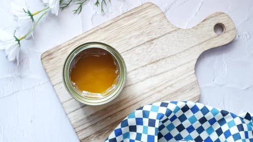 Homemade Ghee in Container on a Table