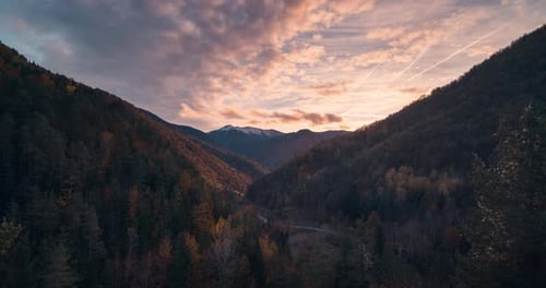 timelapse of colorful sunset in pyrenees valley during fall autumn season pardina del senor forest v