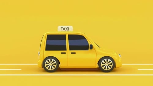Yellow taxi driving on road