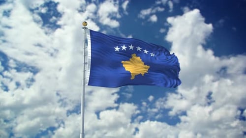 Kosovo Flag Waving in the Wind with Blue Sky Background