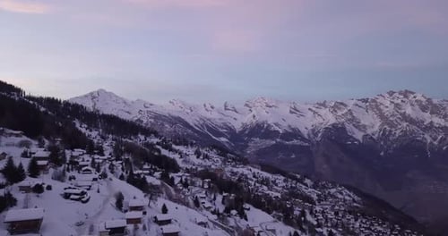 Aerial View Of Town In Rocky Mountain Range