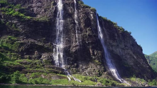 A breathtaking view of the Seven Sisters waterfalls in the Geiranger fjord, Norway. Water falling fr
