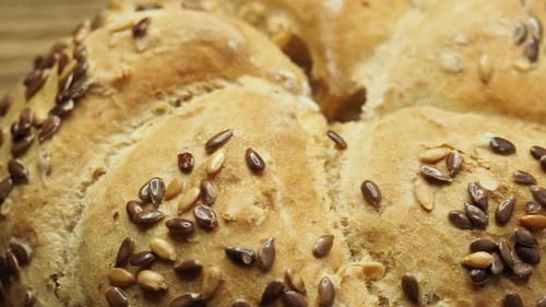 Tasty freshly baked kaiser rolls with seeds