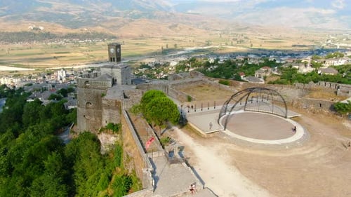 Drone shot 4k. Gjirokastra Castle is a castle in Gjirokastra, Albania. The castle overlooks the city