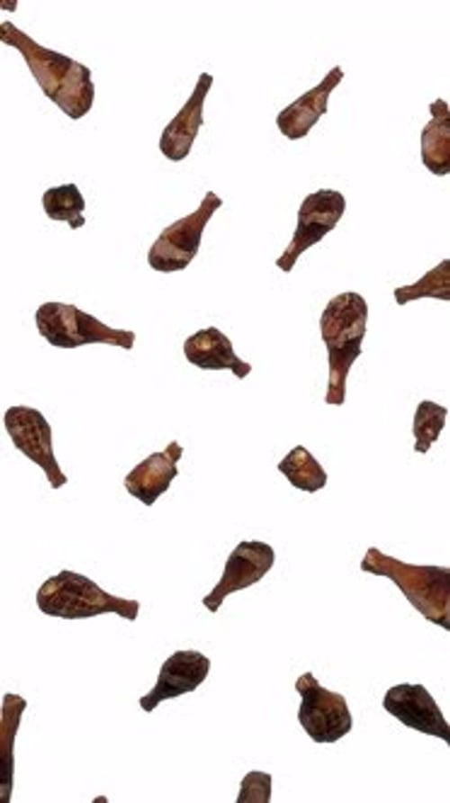 Vertical Floating Grilled Turkey Legs on White