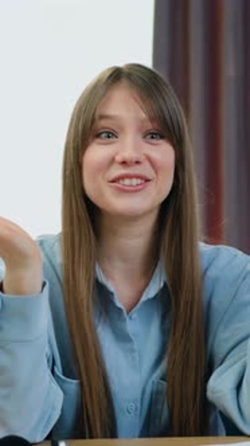 Skilled Woman Having Online Meeting with Followers of Her Social Media Channel Using Professional