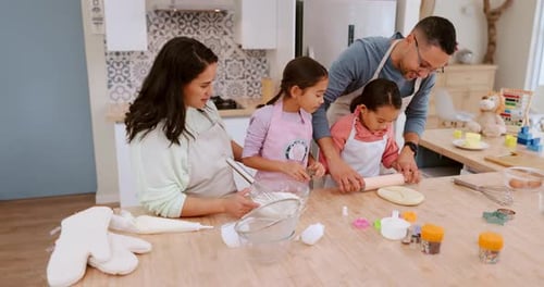 Family Baking Cookies Together in Their Home Kitchen