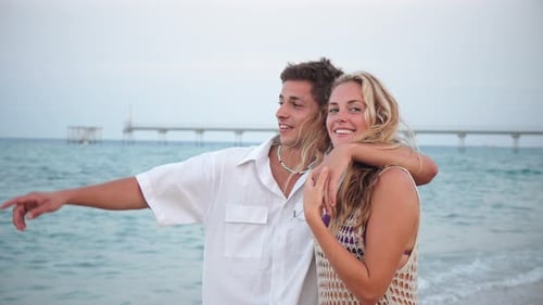 Happy Couple Enjoying Each Other on the Beach